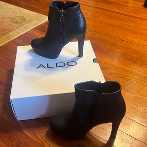 Black platform boots with heel